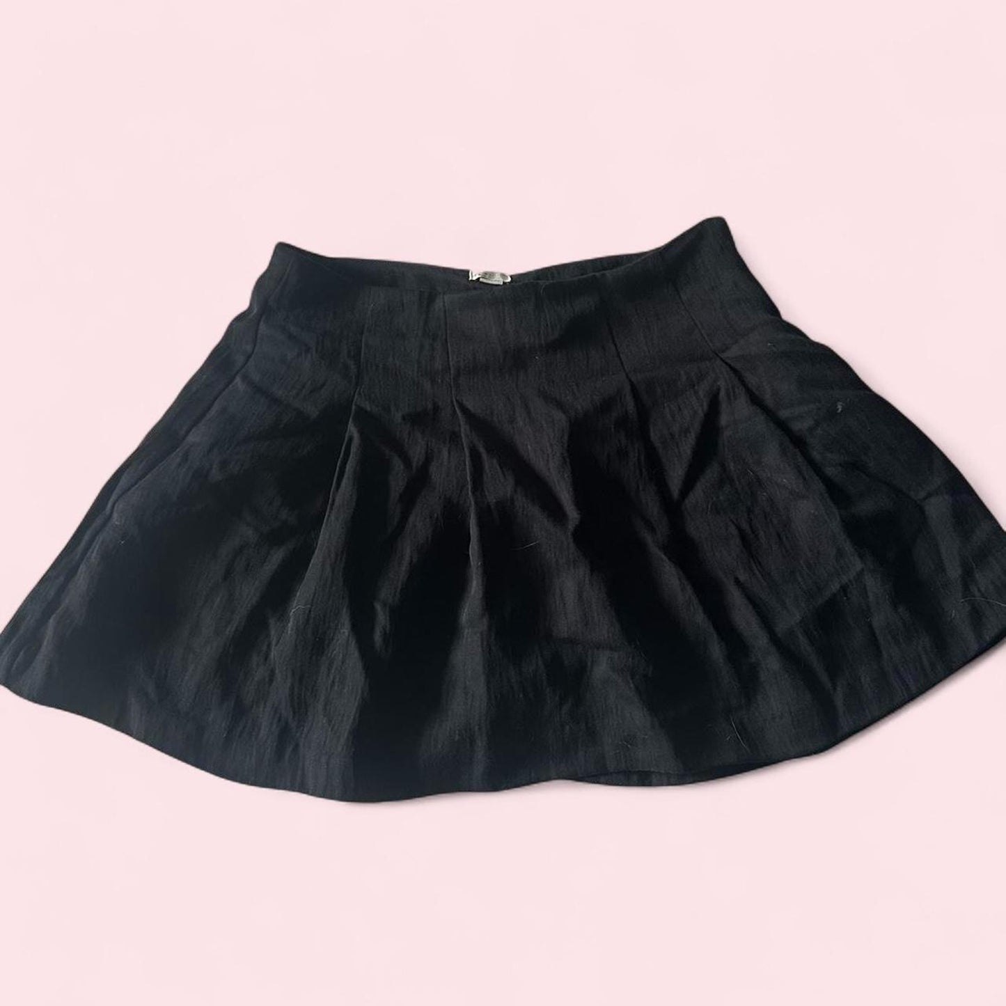pleated mini skirt with shorts underneath