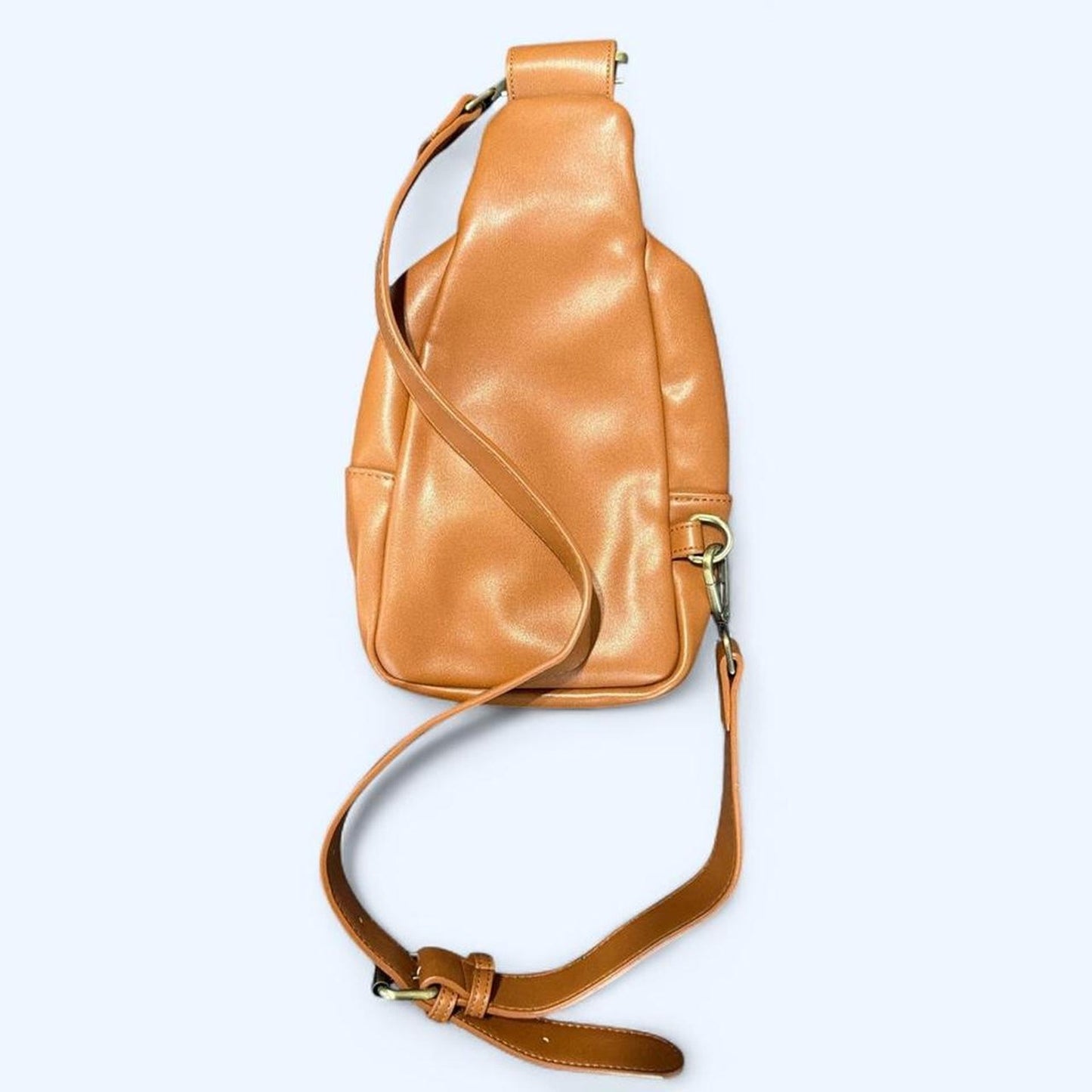 Tan leather crossbody bag with woven design from Anthropology
