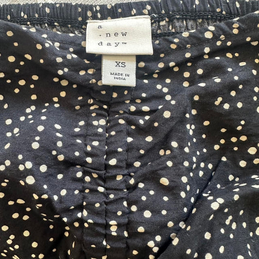 A new day black polka