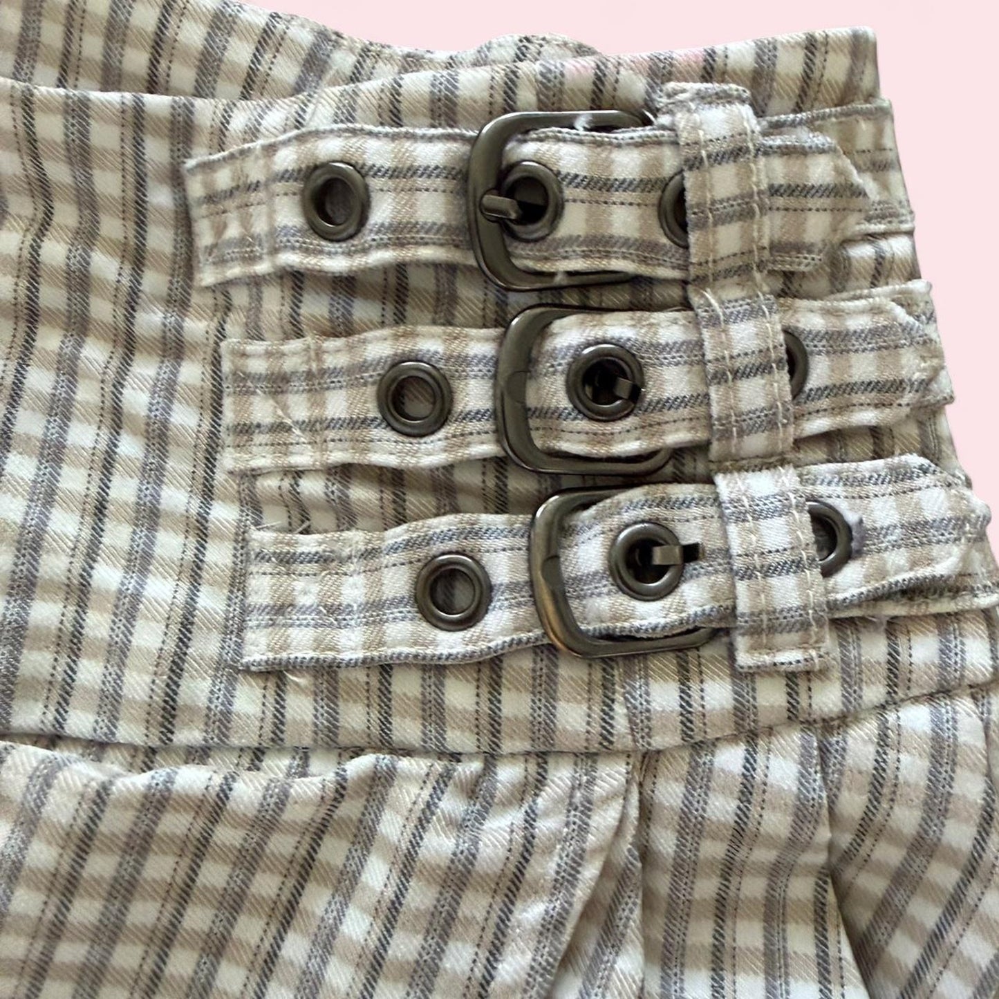 Plaid mini skirt with grommet details