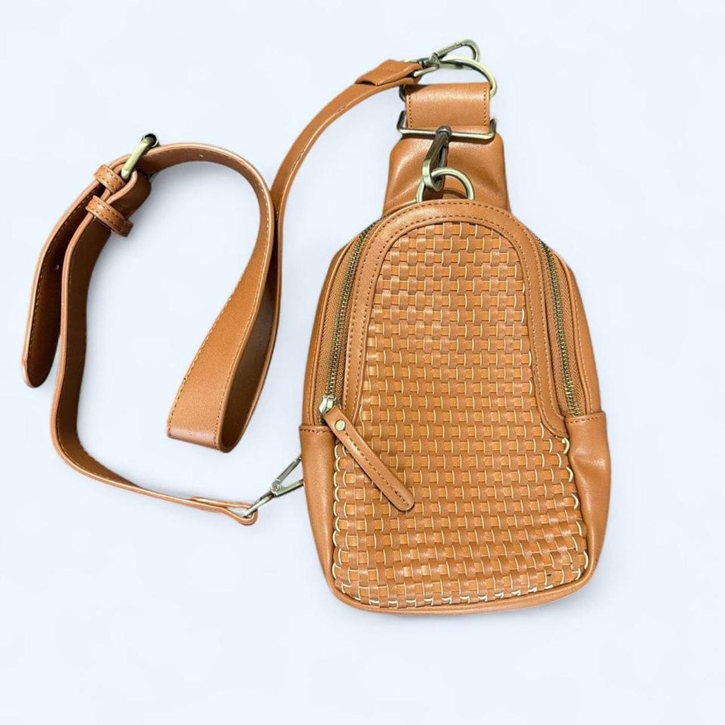 Tan leather crossbody bag with woven design from Anthropology